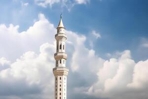 White mosque minaret. Mosque minaret with cloudy sky in background. photo