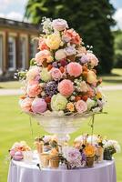 Ice cream desserts buffet table, event food catering for wedding, party and holiday celebration, ice creams and flowers decor in a floral countryside garden, photo