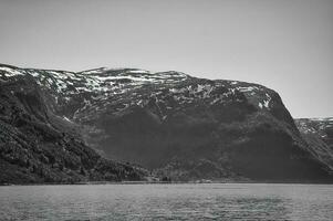 Fjord with view of mountains and fjord landscape in Norway. Landscape shot photo