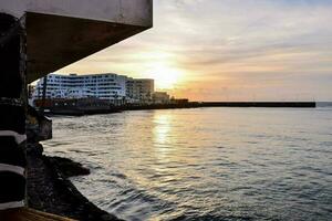 Sunset over the ocean photo