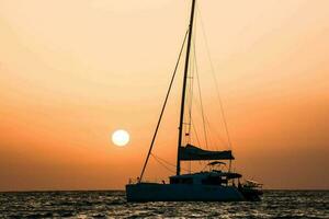 Boat over the sunset photo