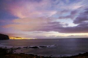 Sunset over the ocean photo