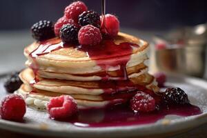 stock photo of warm pancake with blackberry syrup food photography