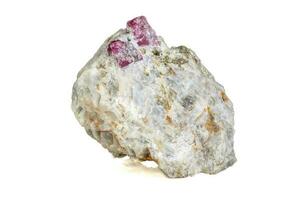 Macro mineral stone Ruby in rock on white background photo