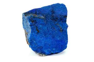 Macro Azurite mineral stone with Pyrite inserts on a white background photo