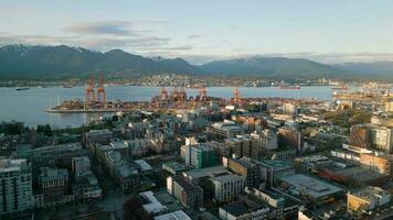 Aerial view of Port of Vancouver, harbour and mountains on the background video