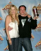Daryl Hannah and Quentin Tarantino n the press room after wining Daryl and Uma Thurman win for best fight scene   at the MTV Movie Awards at the Shrine Auditorium Los Angeles CAJune 4 20052005 photo