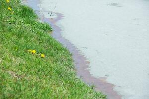 A lake contaminated with toxic waste in the western mountains of Romania. Nature pollution from copper mine. Ecological catastrophe or Environmental disaster photo