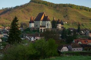 Biertan a very beautiful medieval village in Transylvania, Romania. A historical town in Romania that has preserved the Frankish and Gothic architectural style. Travel photo. photo