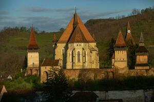 Biertan a very beautiful medieval village in Transylvania, Romania. A historical town in Romania that has preserved the Frankish and Gothic architectural style. Travel photo. photo