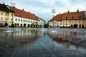 Medieval street with historical buildings in the heart of Romania. Sibiu the eastern European citadel city. Travel in Europe photo