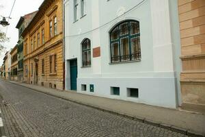 Medieval street with historical buildings in the heart of Romania. Sibiu the eastern European citadel city. Travel in Europe photo