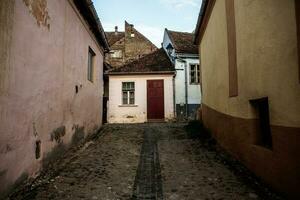 A beautiful medieval citadel city of Sighisoara in the heart of Romania, Transylvania travel destination in Eastern Europe. photo