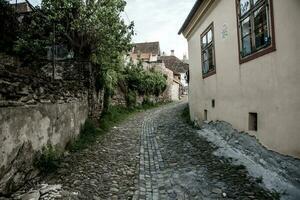 A beautiful medieval citadel city of Sighisoara in the heart of Romania, Transylvania travel destination in Eastern Europe. photo