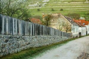 Rimetea is a small village located in Transylvania, Romania. It is situated in the Apuseni Mountains and is known for its picturesque setting and well preserved Hungarian architectural style. photo