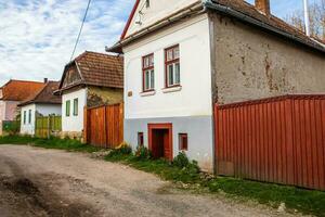 Rimetea is a small village located in Transylvania, Romania. It is situated in the Apuseni Mountains and is known for its picturesque setting and well preserved Hungarian architectural style. photo