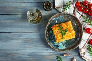 Meat lasagna with bolognese sauce and bechamel sauce. Classic lasagna. Top view photo