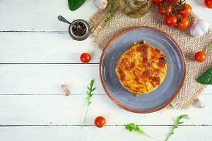 Classic lasagna with minced chiken bolognese sauce and bechamel sauce. Top view photo