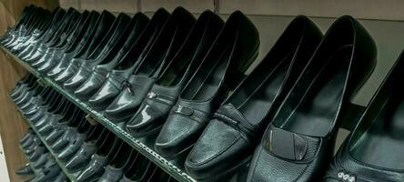 women's shoes, women's shoes on a store shelf. shop window. shoes shop. shelves shoes shop photo