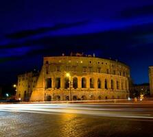 Colosseum at twilight photo