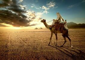 Bedouin at sunset photo