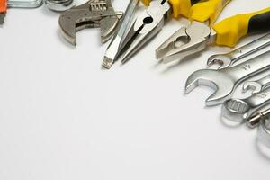 Set of tools for construction or the house. Wrench, pliers, hammer, screwdriver, flashlight, bold, scissors, knife and others. photo