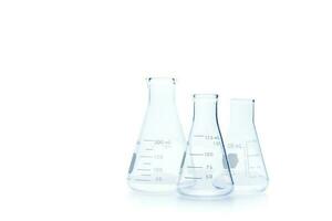 Realistic Glass Laboratory Equipment Set. Flasks and measuring beaker for science experiment in laboratory photo