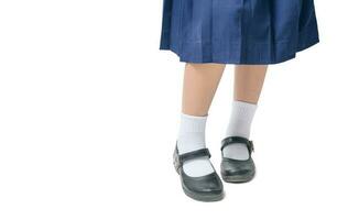 Asian Thai girls schoolgirl student wear a black leather shoes as a school uniform photo