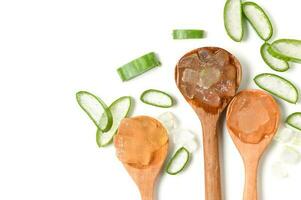 Fresh Slice Aloe Vera on wood spoon iaolated on white background and top view photo