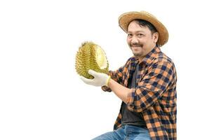 Happy farmer is carrying durian and smiling isolated on white photo