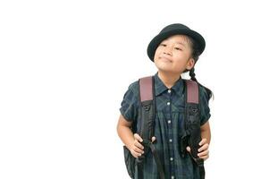 Cute little girl wearing hat smiling and holding backpack photo
