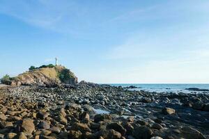 White lighthouse on a cliff at Lanta noi island, south of Thailand Krabi photo