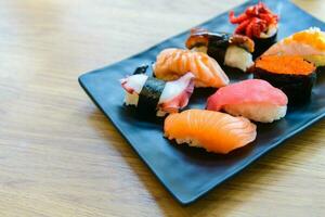 Nigiri Sushi set with salmon, grouper, eel, tuna and prawn photo