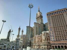 Mecca, Saudi Arabia, April 2023 - A beautiful daytime view of the Makkah Clock Tower from the courtyard of Masjid al-Haram, Mecca. photo