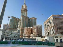 Mecca, Saudi Arabia, April 2023 - A beautiful daytime view of the Makkah Clock Tower from the courtyard of Masjid al-Haram, Mecca. photo