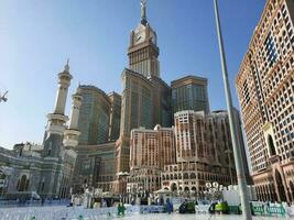 Mecca, Saudi Arabia, April 2023 - A beautiful daytime view of the Makkah Clock Tower from the courtyard of Masjid al-Haram, Mecca. photo