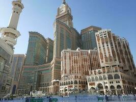 Mecca, Saudi Arabia, April 2023 - A beautiful daytime view of the Makkah Clock Tower from the courtyard of Masjid al-Haram, Mecca. photo