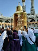 Mecca, Saudi Arabia, May 2023 - Beautiful daytime close-up view of Maqam Ibrahim in the courtyard of Masjid al-Haram, Mecca. photo