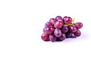 Bunch of ripe red grapes isolated on white background with copy space. photo