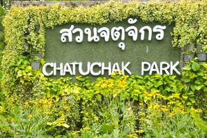 Signs and flowers in Chatuchak Park photo