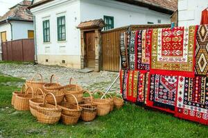 Rimetea is a small village located in Transylvania, Romania. It is situated in the Apuseni Mountains and is known for its picturesque setting and well preserved Hungarian architectural style. photo