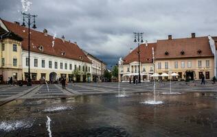 Medieval street with historical buildings in the heart of Romania. Sibiu the eastern European citadel city. Travel in Europe photo