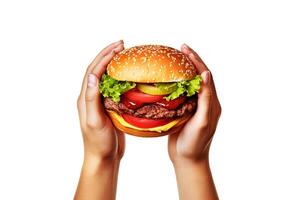 Hands holding a hamburger isolated on white background. photo