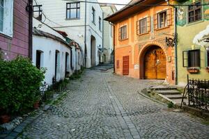 A beautiful medieval citadel city of Sighisoara in the heart of Romania, Transylvania travel destination in Eastern Europe. photo