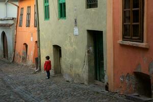 A beautiful medieval citadel city of Sighisoara in the heart of Romania, Transylvania travel destination in Eastern Europe. photo