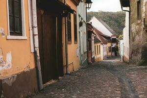 A beautiful medieval citadel city of Sighisoara in the heart of Romania, Transylvania travel destination in Eastern Europe. photo