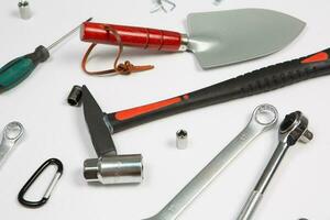 Set of tools for repair in a case on a white background. Assorted work or construction tools. Wrenches, Pliers, screwdriver. Top view photo