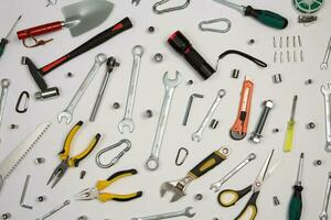 Set of tools for repair in a case on a white background. Assorted work or construction tools. Wrenches, Pliers, screwdriver. Top view photo