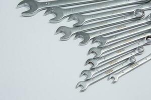 Set of tools for repair in a case on a white background. Assorted work or construction tools. Wrenches, Pliers, screwdriver. Top view photo