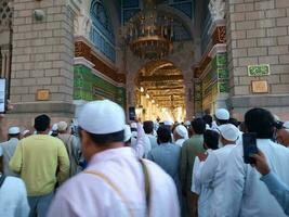 Medina, Saudi Arabia, May 2023 - Muslim pilgrims are going to visit Roza Rasool at Masjid Al Nabawi Medina. photo